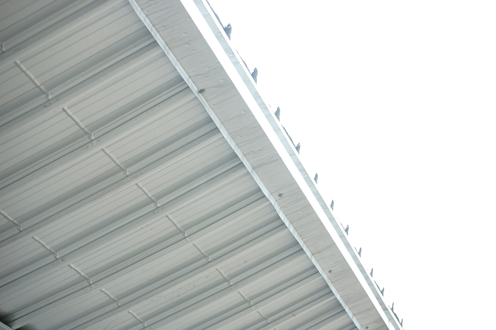 View of underside of gutters and soffit.